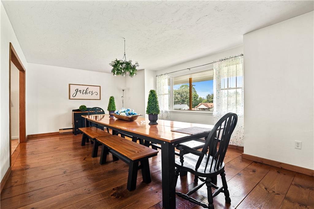 154 Central Road Tarrs, PA 15688 - Photo 6 of 24 a view of a dining room with furniture window and wooden floor
