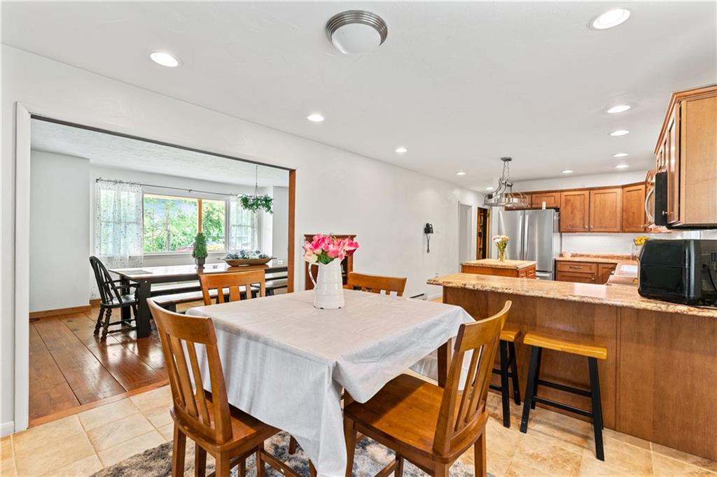 154 Central Road Tarrs, PA 15688 - Photo 8 of 24 a view of a dining room with furniture and a table