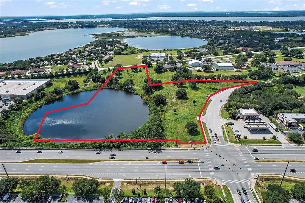 441 Drive Tavares Eustis, FL 32726 - Photo 2 of 8 an aerial view of a city