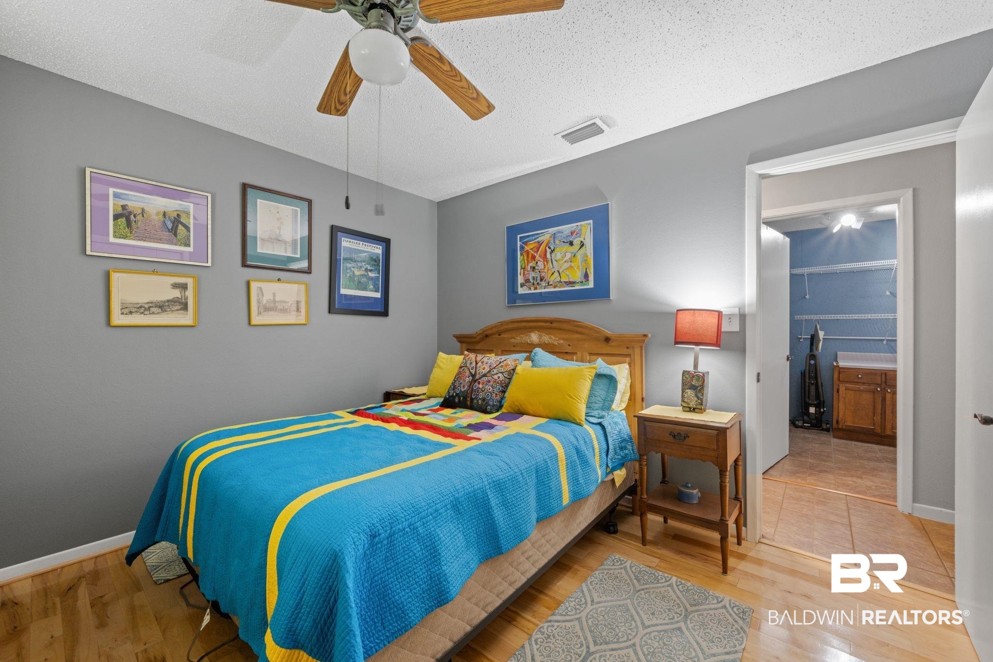 40 Caisson Trace Daphne, AL 36527 - Photo 18 of 54 Bedroom featuring hardwood / wood-style flooring, and ceiling fan