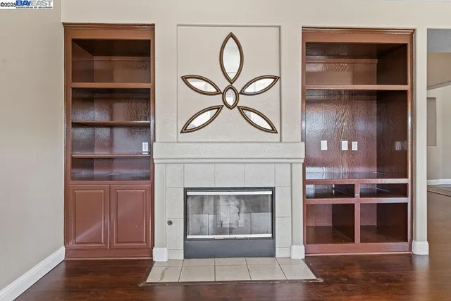 a living room with a fireplace