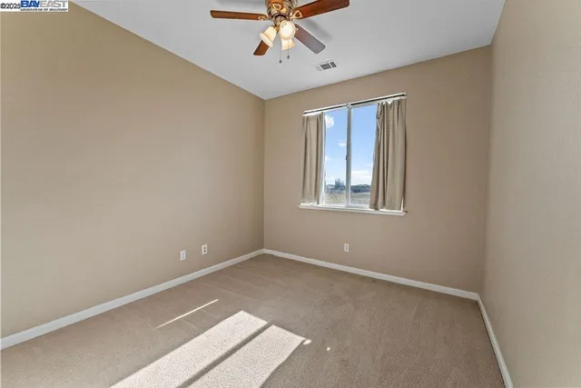a bathroom with a double vanity sink toilet and shower