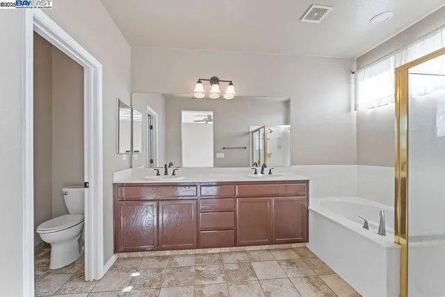 a view of backyard with seating space