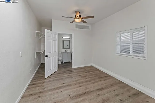 a view of a chairs and table in patio