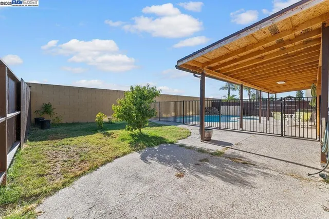 a view of a house with swimming pool