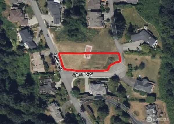 an aerial view of a house with swimming pool