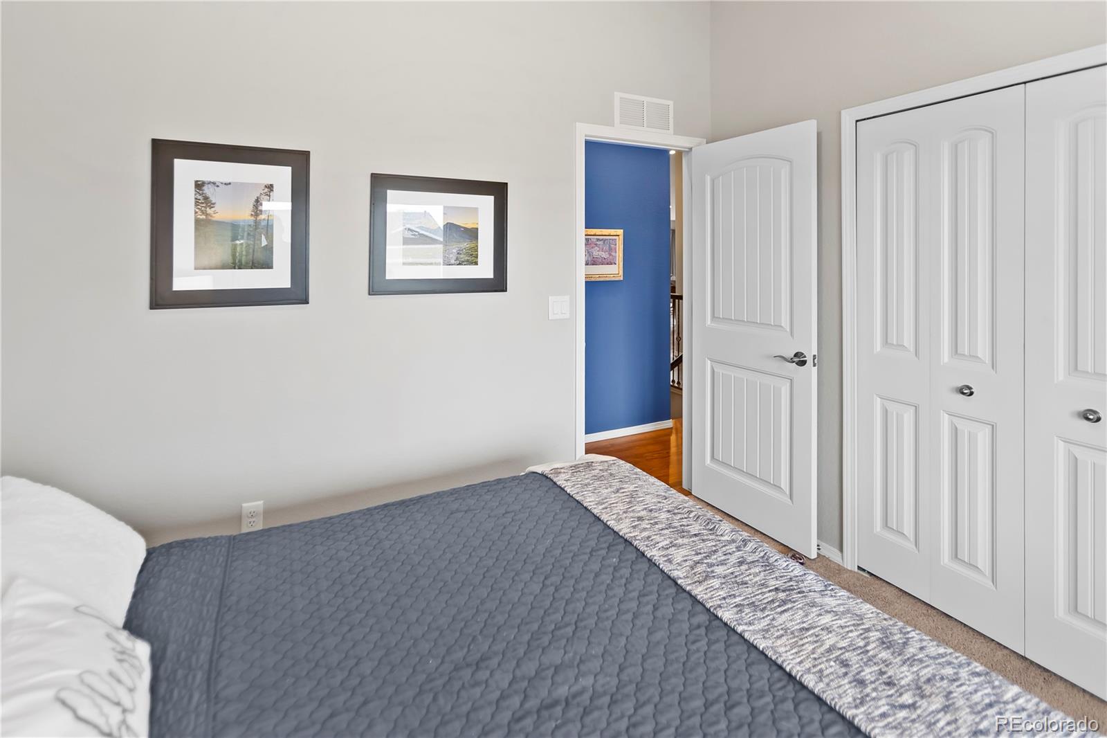 10687 Hidden Brook Circle Colorado Springs, CO 80908 - Photo 22 of 36 a bedroom with windows