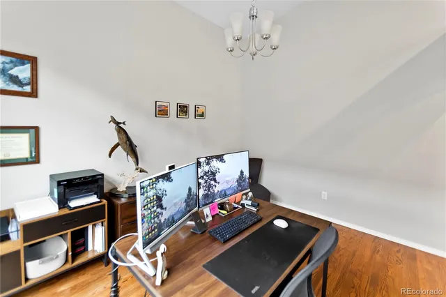 a view of a livingroom with furniture and window