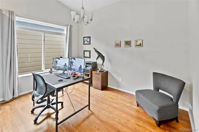 a view of a kitchen from the hallway