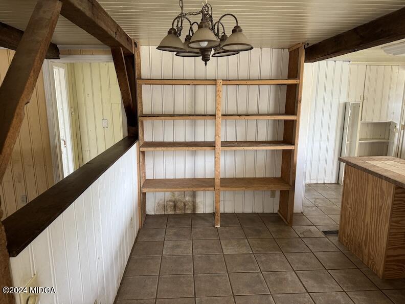 612 Horne Road Roberta, GA 31078 - Photo 20 of 29 a view of a hallway with wooden shelves