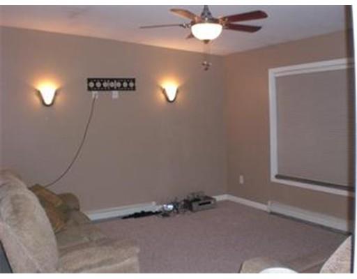 180 Corbin Road Dudley, MA 01571 - Photo 16 of 27 a view of an empty room with a window