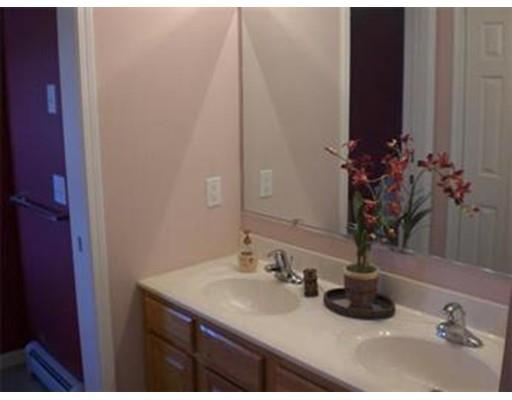 180 Corbin Road Dudley, MA 01571 - Photo 20 of 27 a bathroom with a sink and a mirror
