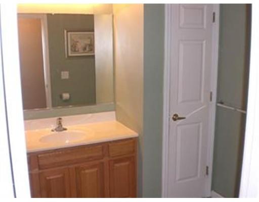 180 Corbin Road Dudley, MA 01571 - Photo 24 of 27 a bathroom with a sink and a mirror