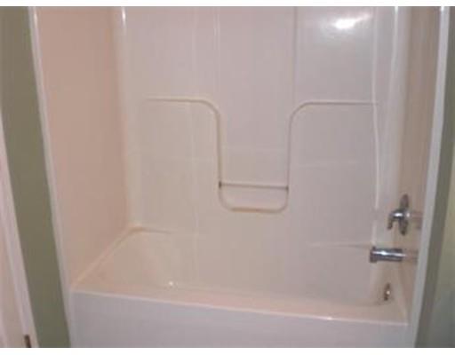 180 Corbin Road Dudley, MA 01571 - Photo 25 of 27 a bathroom with a bathtub