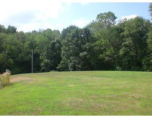 180 Corbin Road Dudley, MA 01571 - Photo 9 of 27 a view of an outdoor space and a yard