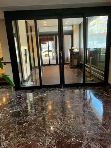 a view of a living room and a window