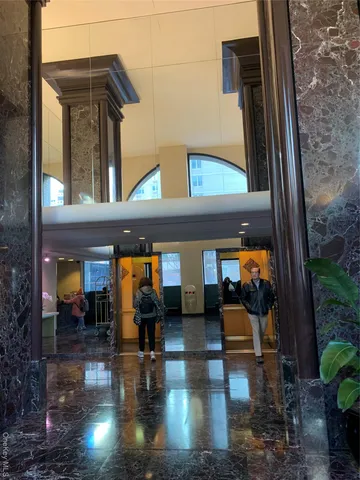 a view of living room filled with furniture