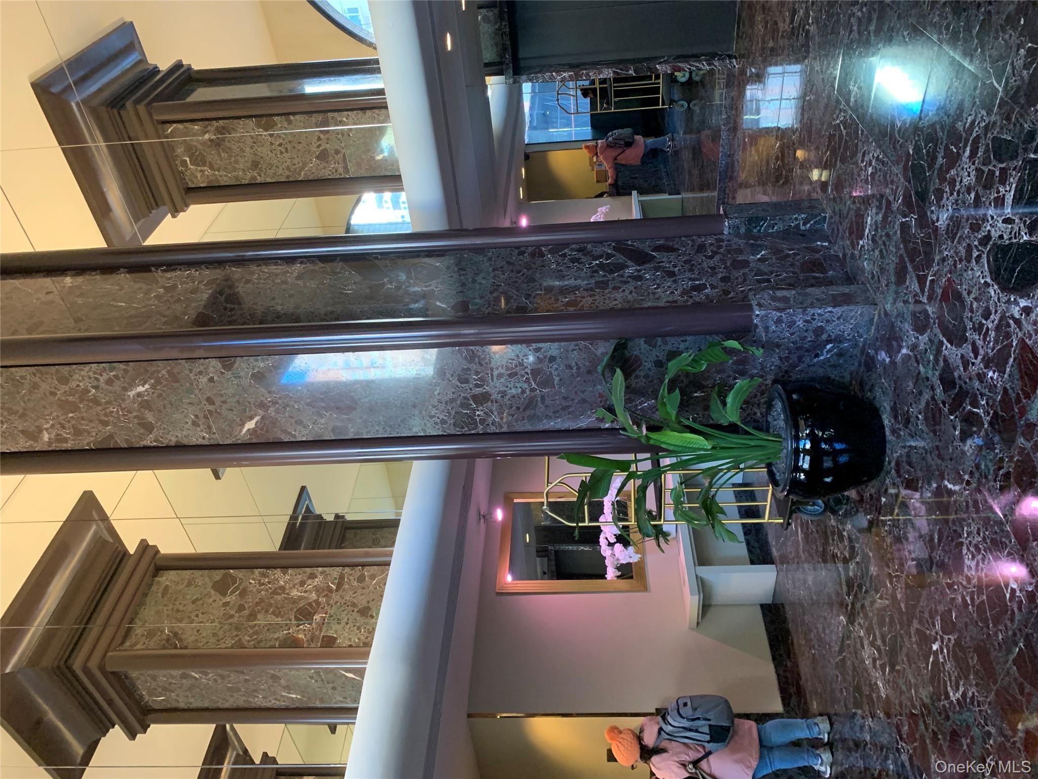 400 East 70th Street, Unit 3501 Manhattan, NY 10021 - Photo 4 of 21 a view of front door of house