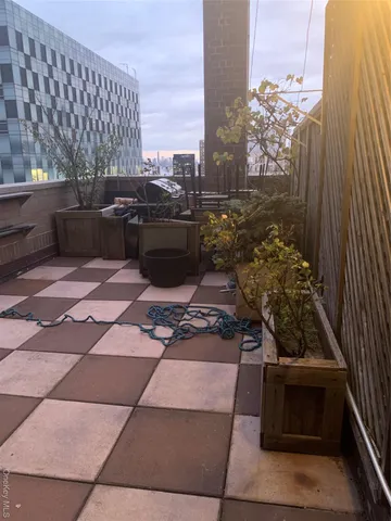 a view of a terrace with outdoor seating