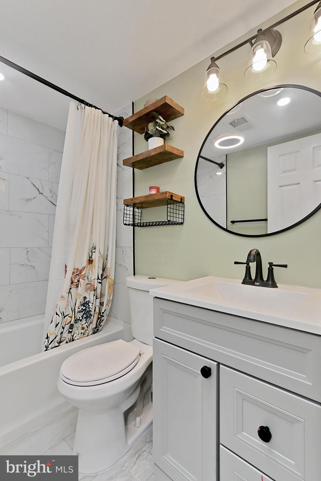 8318 Kingsgate Road, Unit 545 Springfield, VA 22152 - Photo 22 of 56 Beautifully updated hall bath (2024)