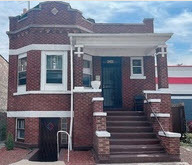4349 West Cermak Road Chicago, IL 60623 - Photo 1 of 1 a front view of a house with stairs