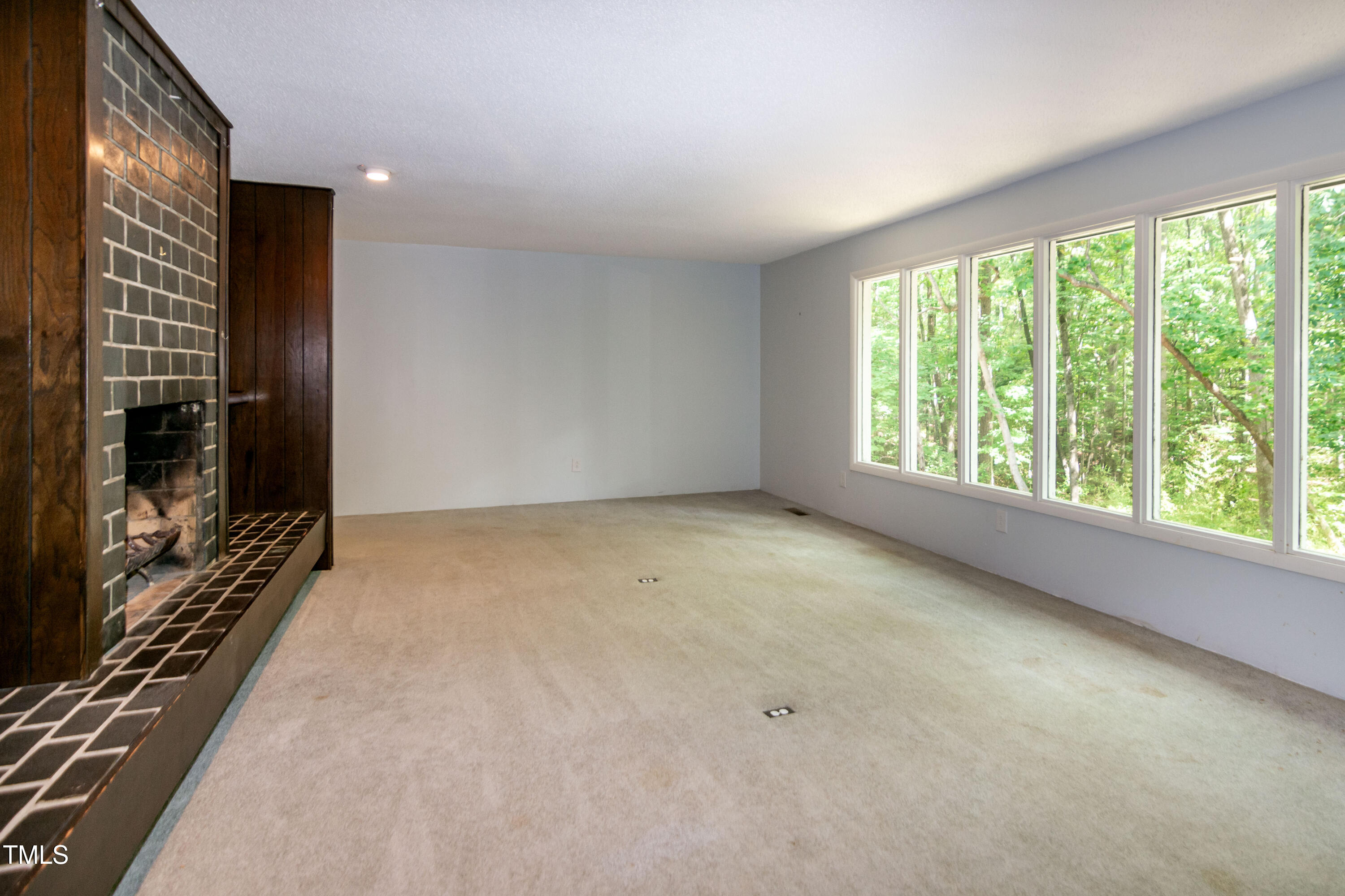 5213 Tomahawk Trail Raleigh, NC 27610 - Photo 17 of 80 a view of an empty room with a window