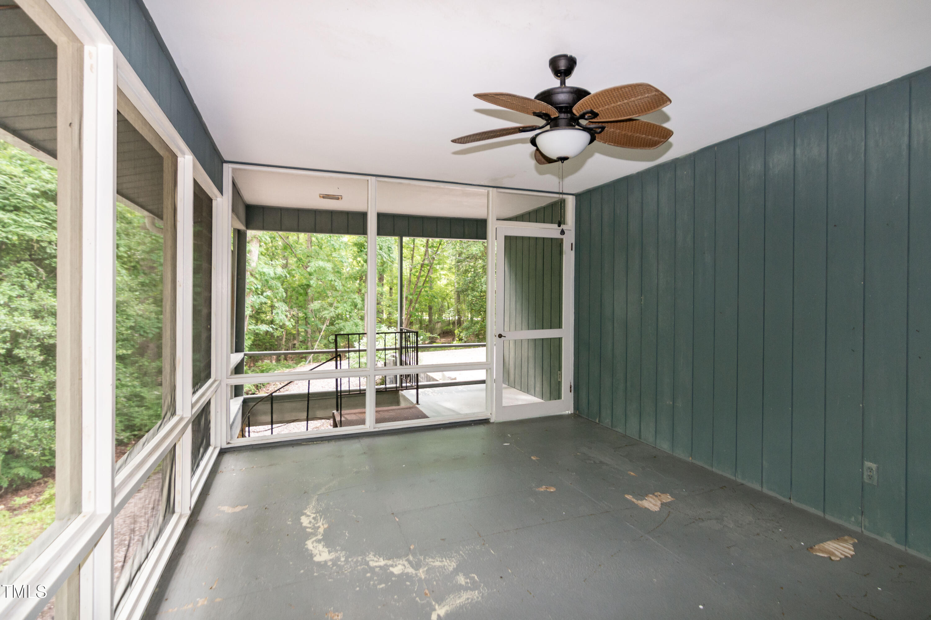 5213 Tomahawk Trail Raleigh, NC 27610 - Photo 22 of 80 a view of a chandelier fan and wooden floor in a room