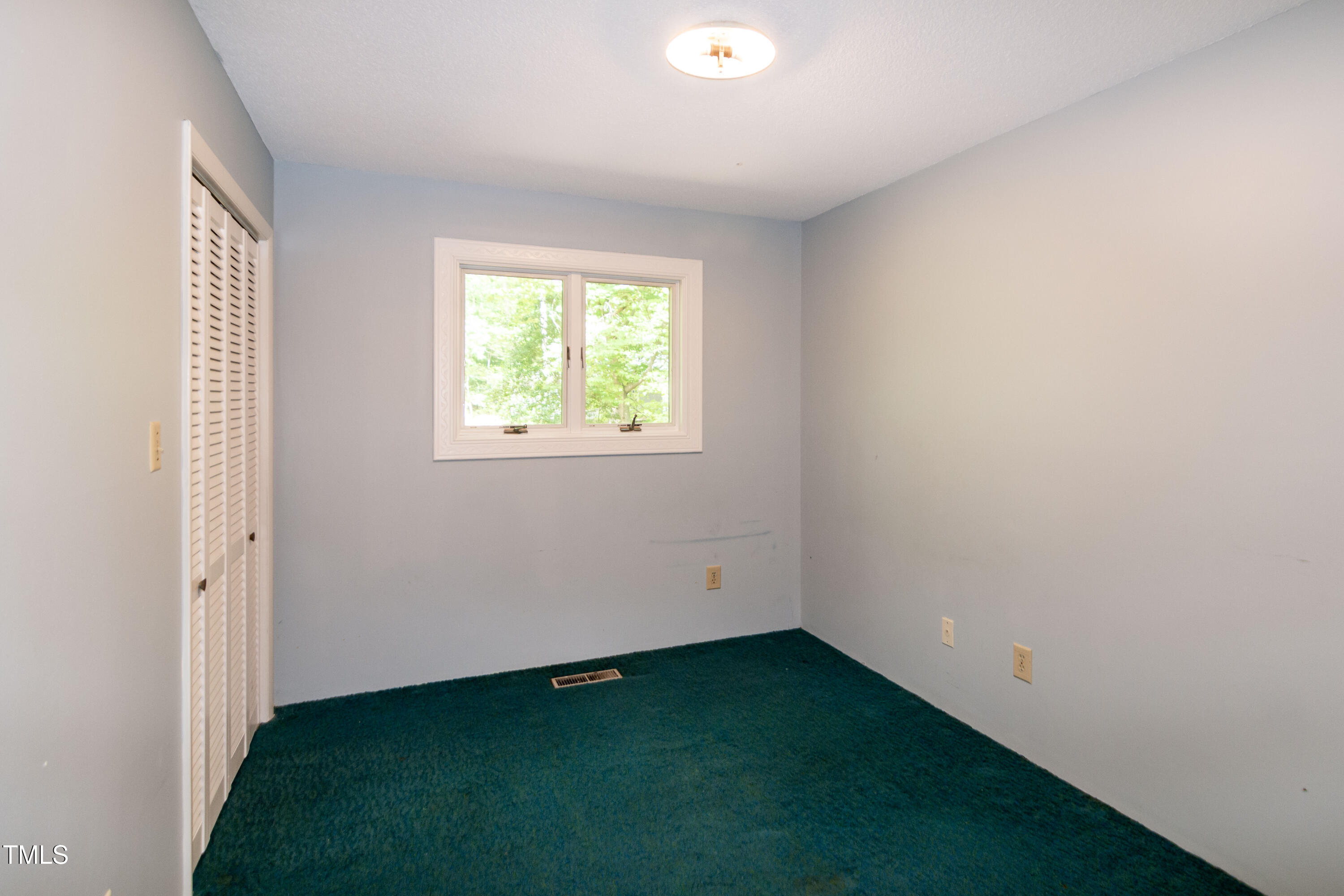 5213 Tomahawk Trail Raleigh, NC 27610 - Photo 34 of 80 an empty room with a window