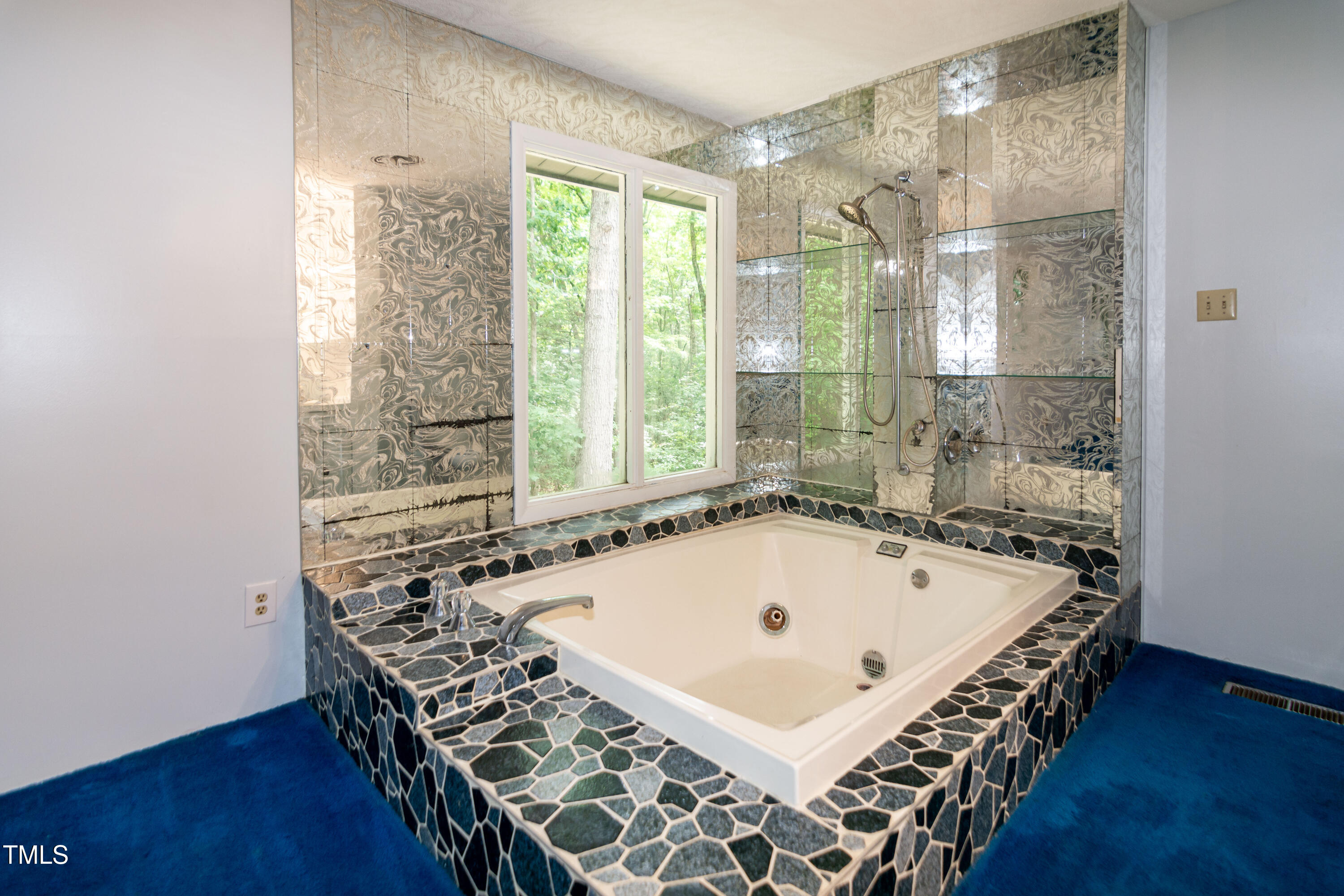 5213 Tomahawk Trail Raleigh, NC 27610 - Photo 41 of 80 a bathroom with a bath tub and a shower