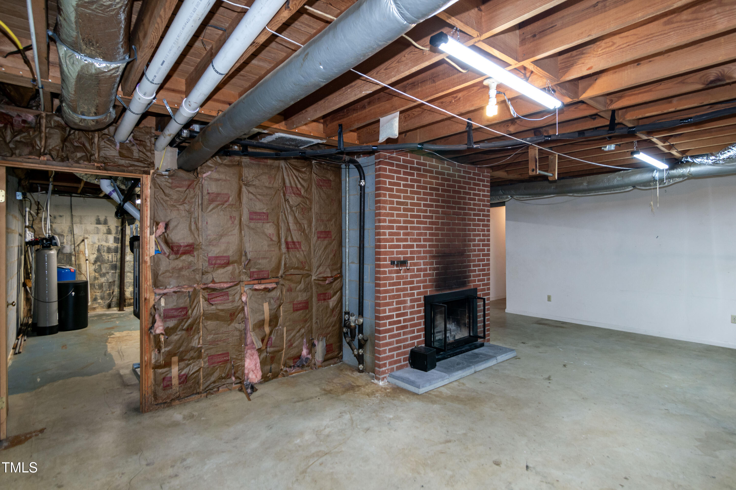 5213 Tomahawk Trail Raleigh, NC 27610 - Photo 46 of 80 a view of an empty room with a fireplace