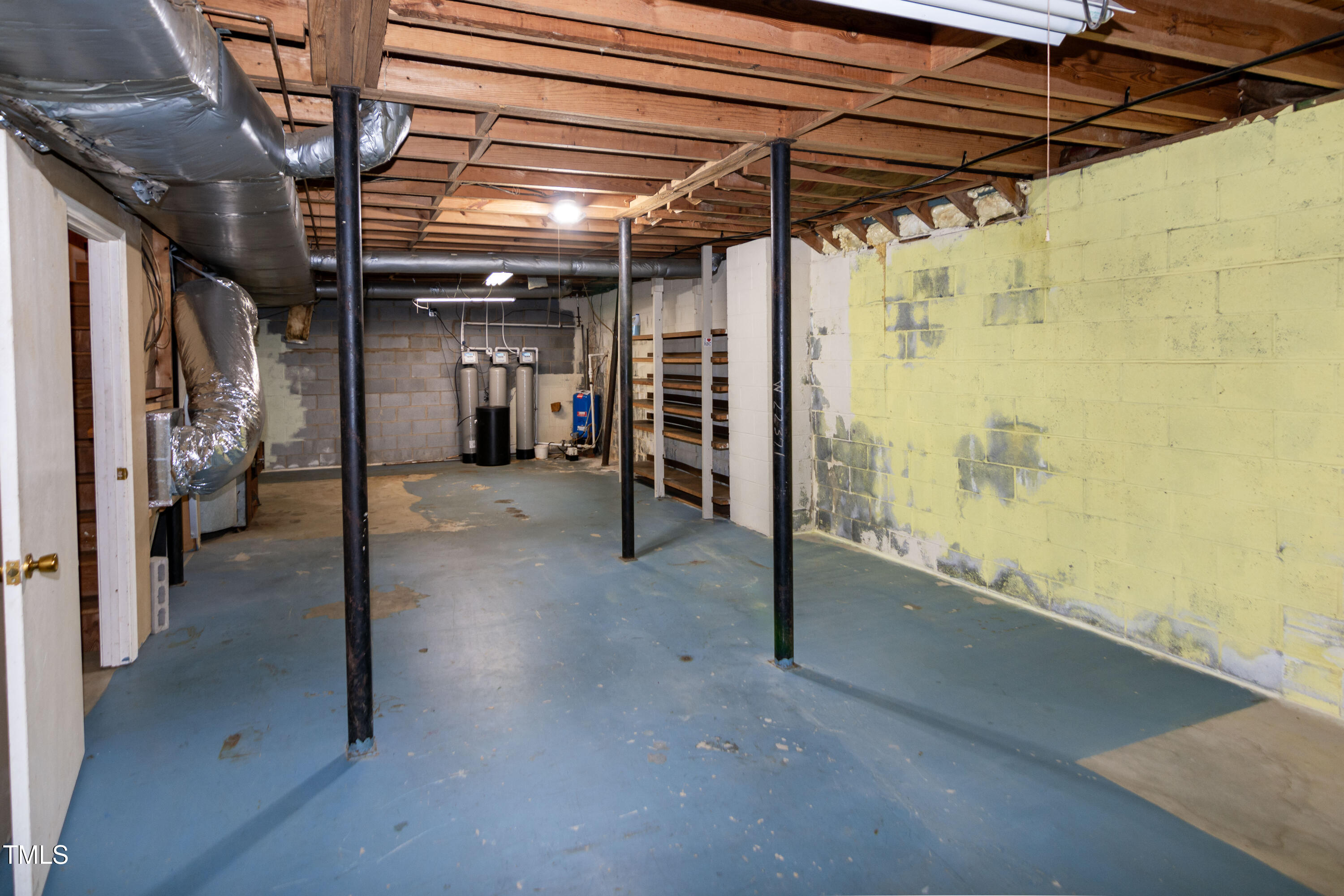 5213 Tomahawk Trail Raleigh, NC 27610 - Photo 52 of 80 a view of a hallway with wooden walls