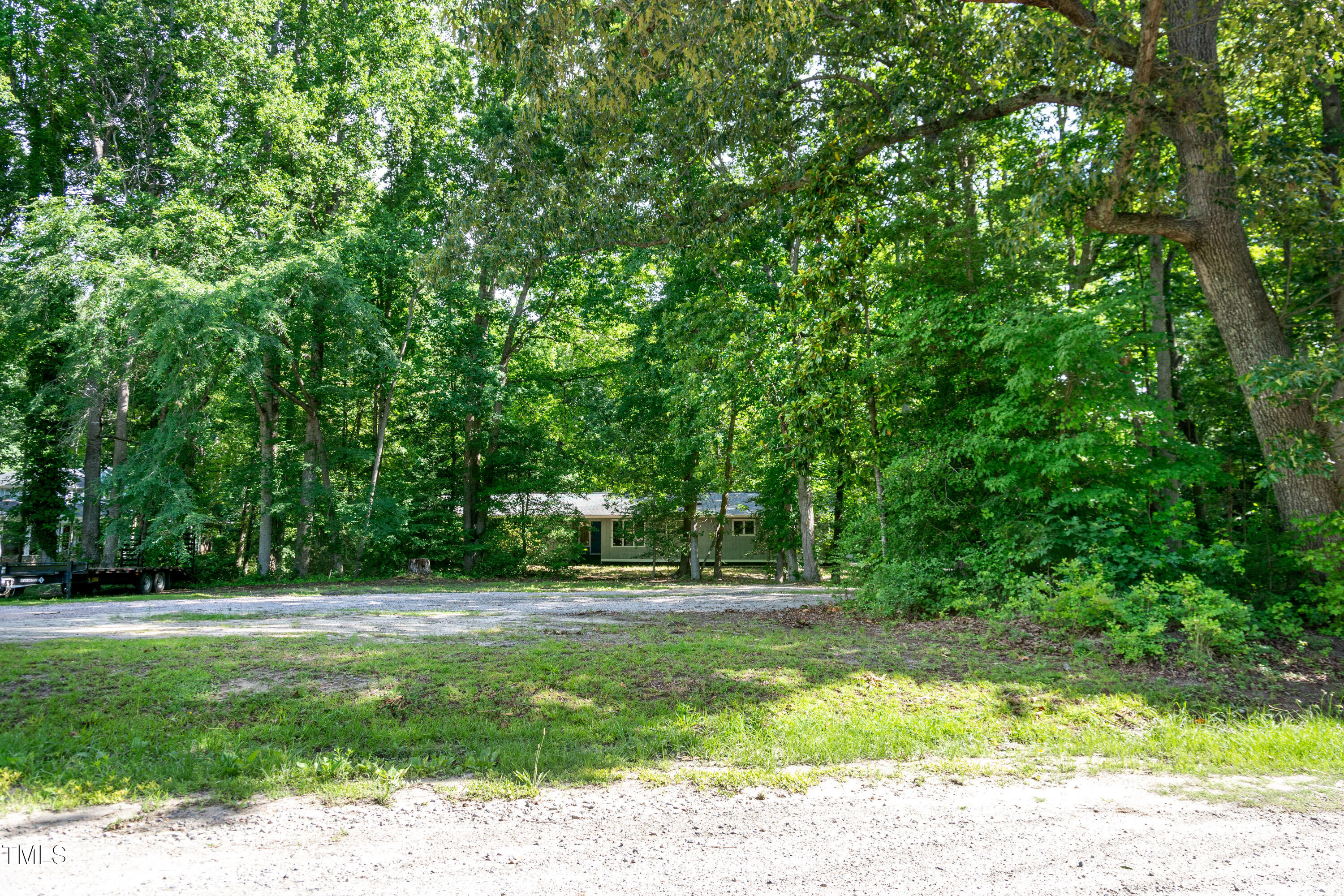 5213 Tomahawk Trail Raleigh, NC 27610 - Photo 60 of 80 a view of outdoor space with deck and green space