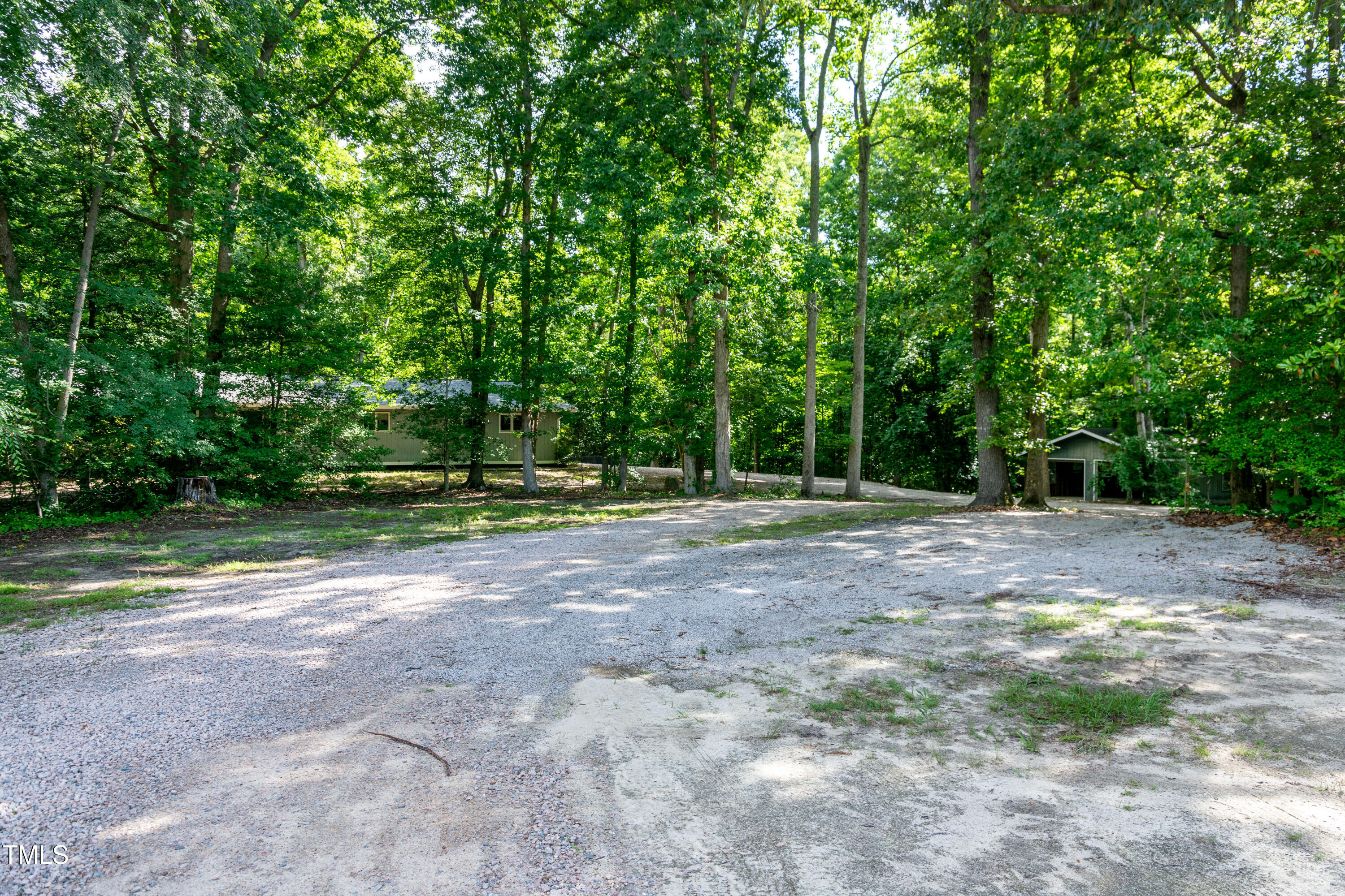 5213 Tomahawk Trail Raleigh, NC 27610 - Photo 63 of 80 a view of outdoor space with trees