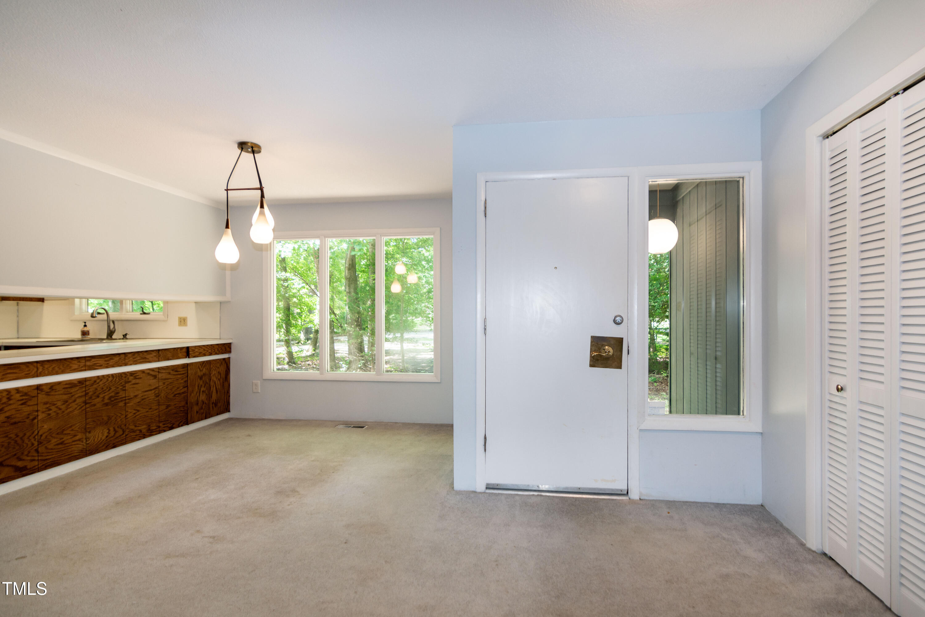 5213 Tomahawk Trail Raleigh, NC 27610 - Photo 7 of 80 a view of an empty room with window and bathroom