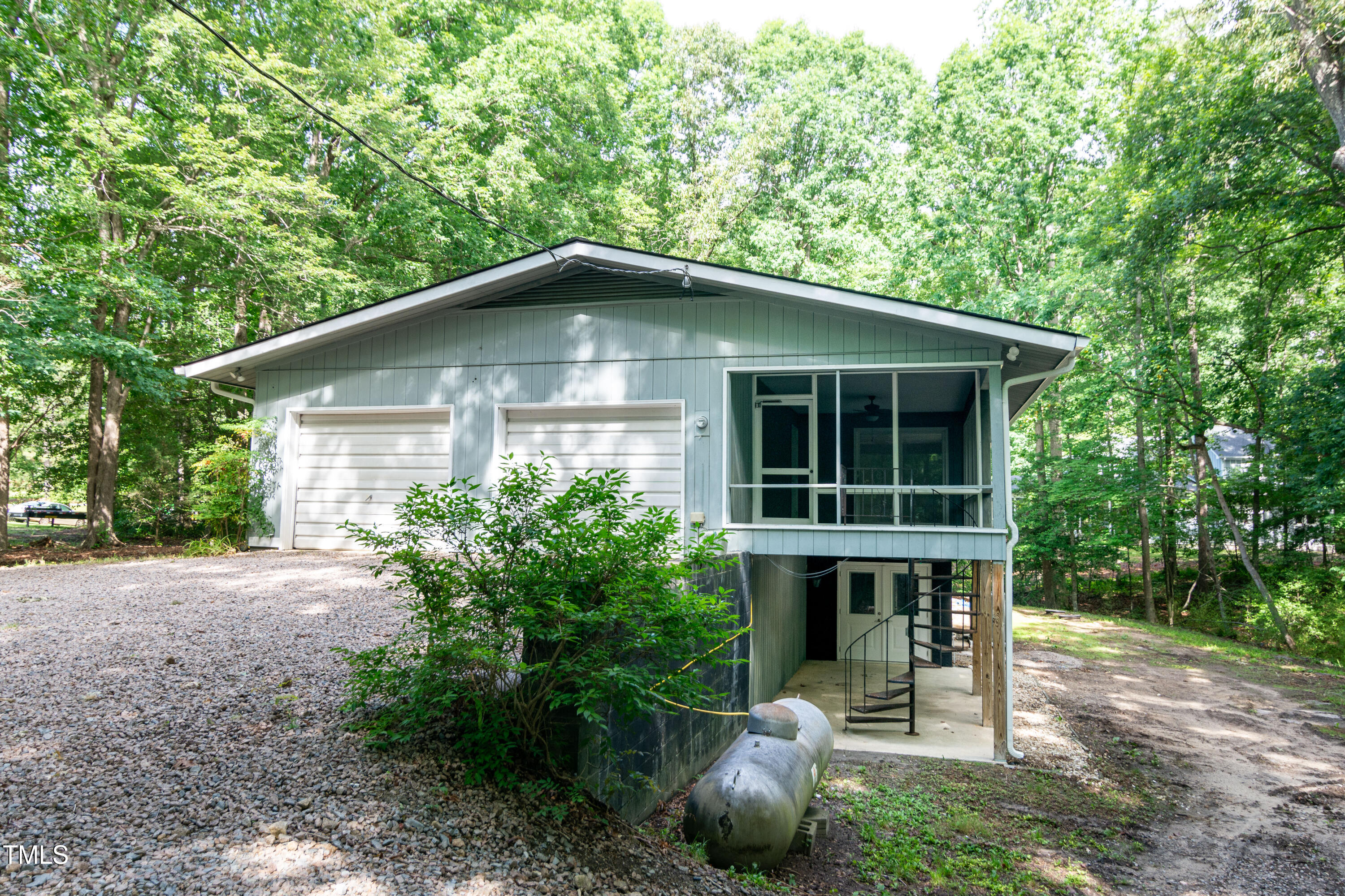 5213 Tomahawk Trail Raleigh, NC 27610 - Photo 71 of 80 a front view of a house with a garden