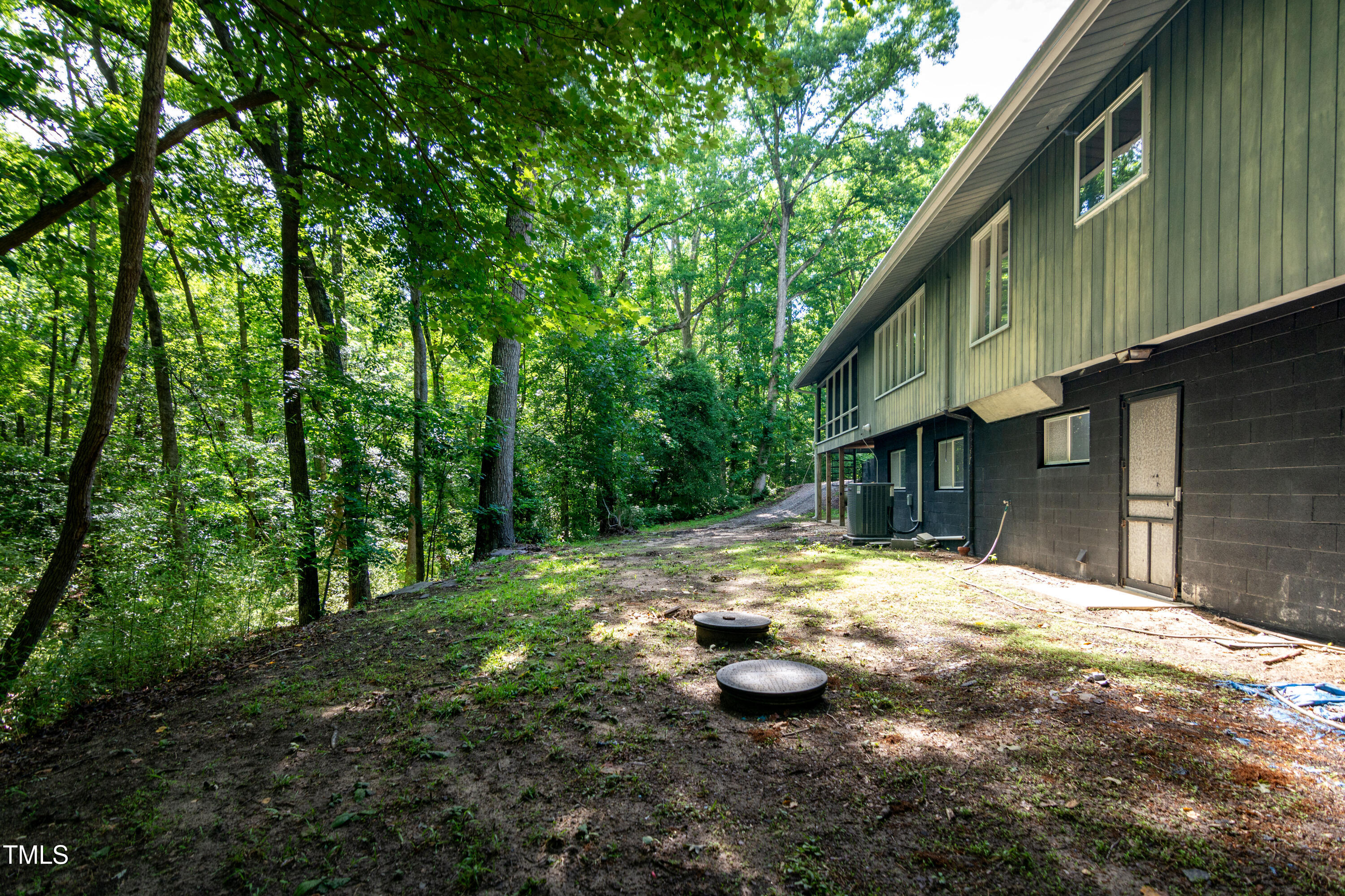 5213 Tomahawk Trail Raleigh, NC 27610 - Photo 74 of 80 a view of a house with backyard