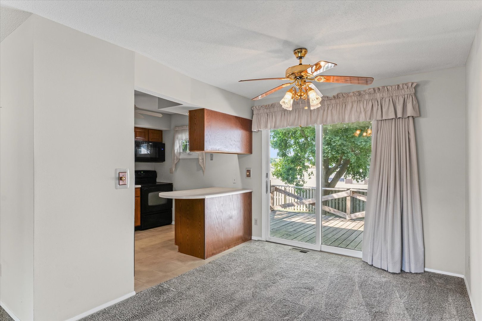 1613 Carolina Drive Rantoul, IL 61866 - Photo 11 of 50 a view of kitchen with microwave and stove