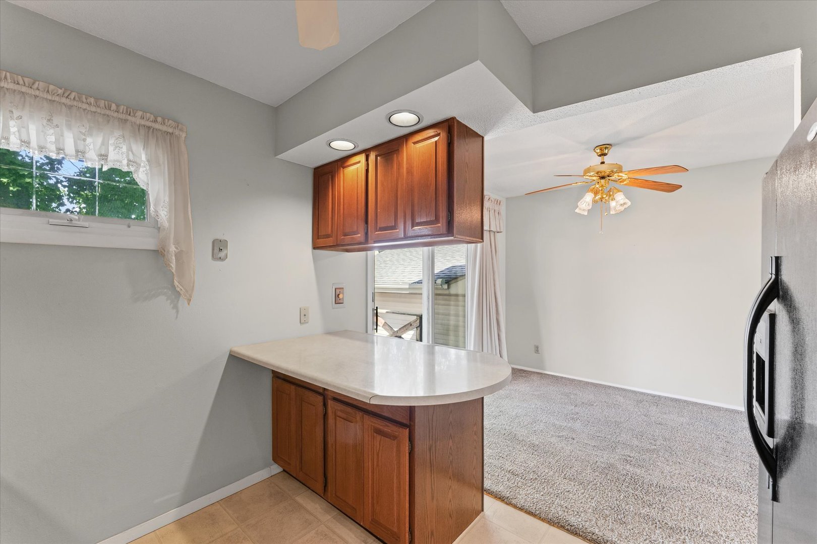 1613 Carolina Drive Rantoul, IL 61866 - Photo 18 of 50 a kitchen with a sink cabinets and a window
