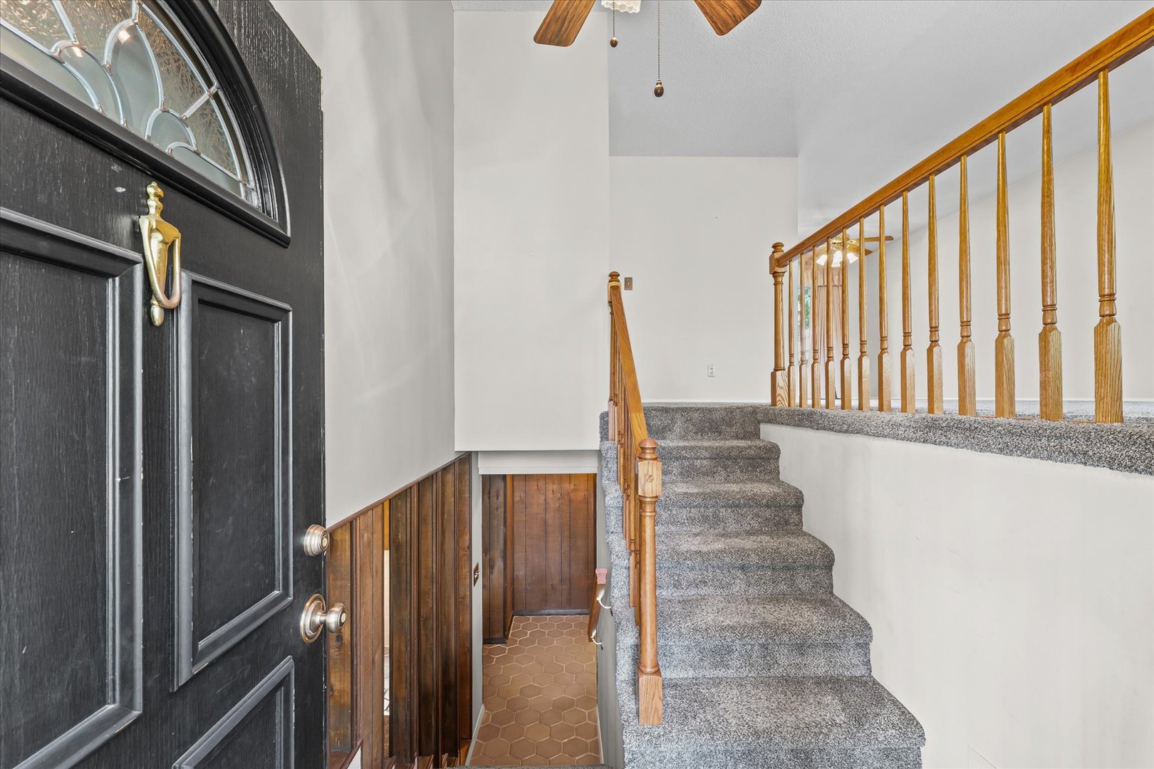1613 Carolina Drive Rantoul, IL 61866 - Photo 28 of 50 a view of entryway with wooden floor and stairs