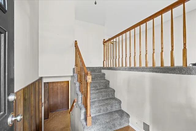 a view of entryway with wooden floor