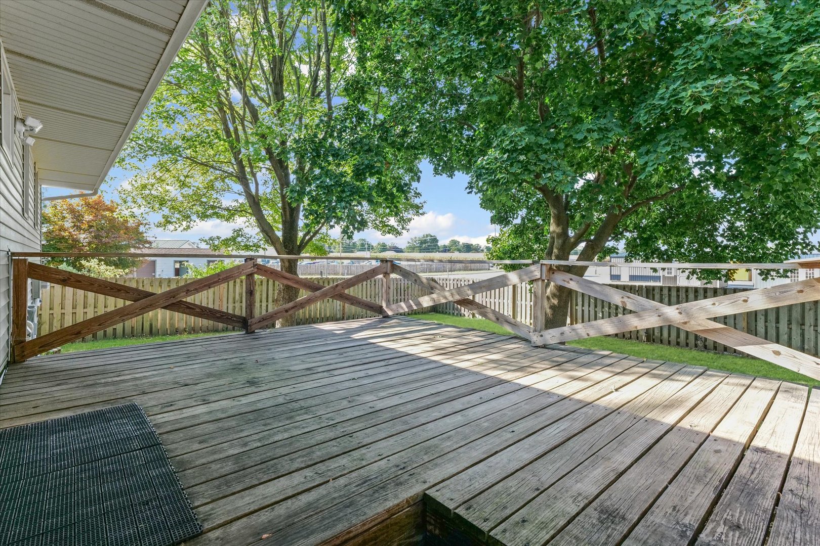 1613 Carolina Drive Rantoul, IL 61866 - Photo 44 of 50 a view of deck with wooden floor and seating space
