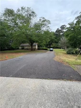 $999,999 | 4897 Lou Ivy Road, Peachtree Corners, GA 30096