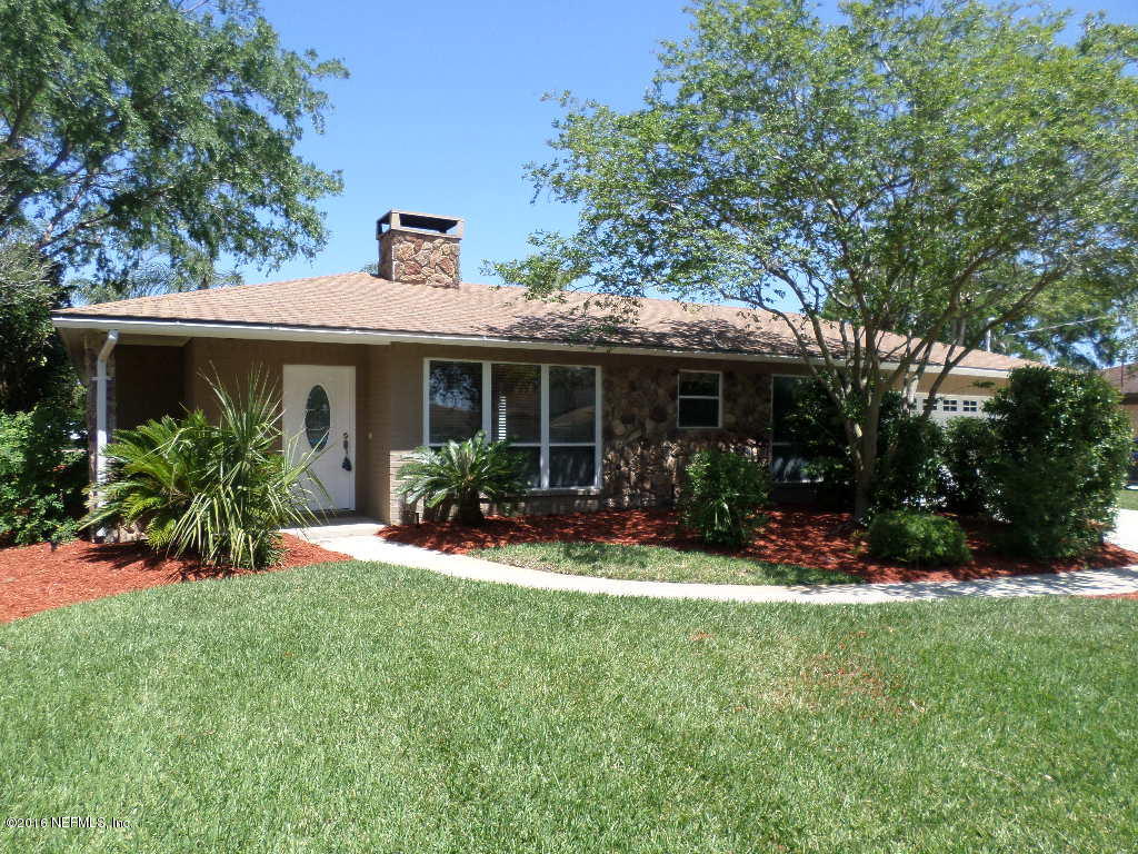 4237 Stacey Road Jacksonville, FL 32250 - Photo 21 of 22 a front view of house with yard and green space