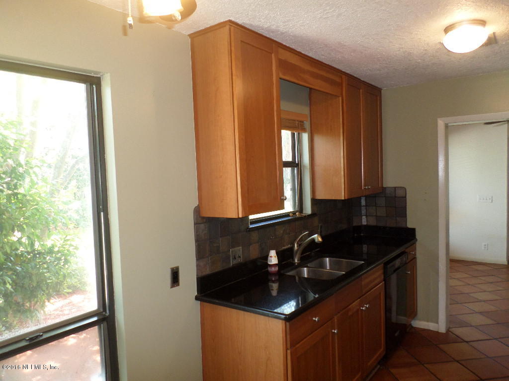 4237 Stacey Road Jacksonville, FL 32250 - Photo 8 of 22 a kitchen with a sink and a window