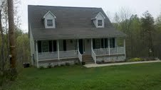 5191 Horseshoe Bend Road Goodview, VA 24095 - Photo 2 of 8 a view of a house with a yard