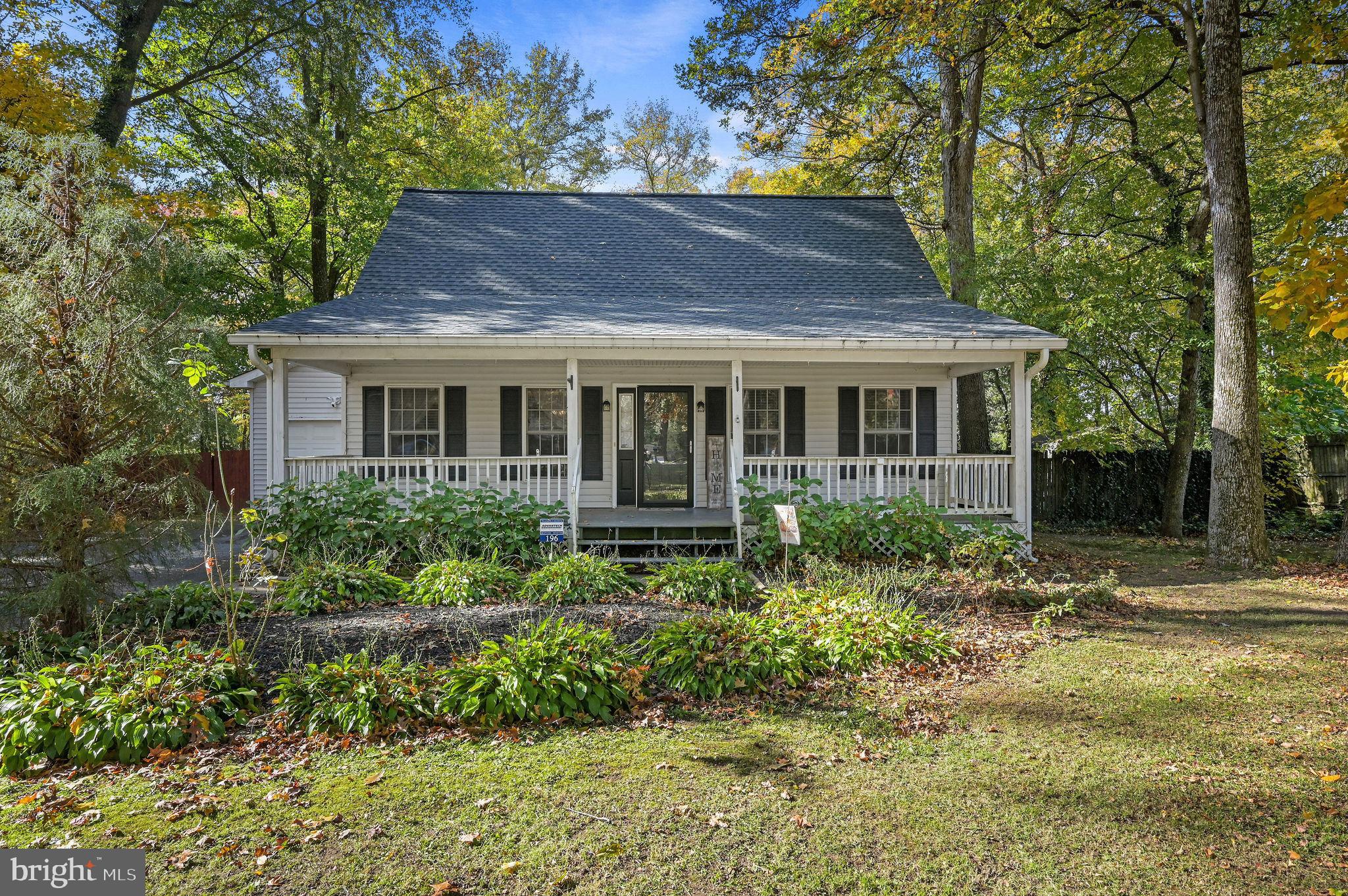 a house view with a garden space