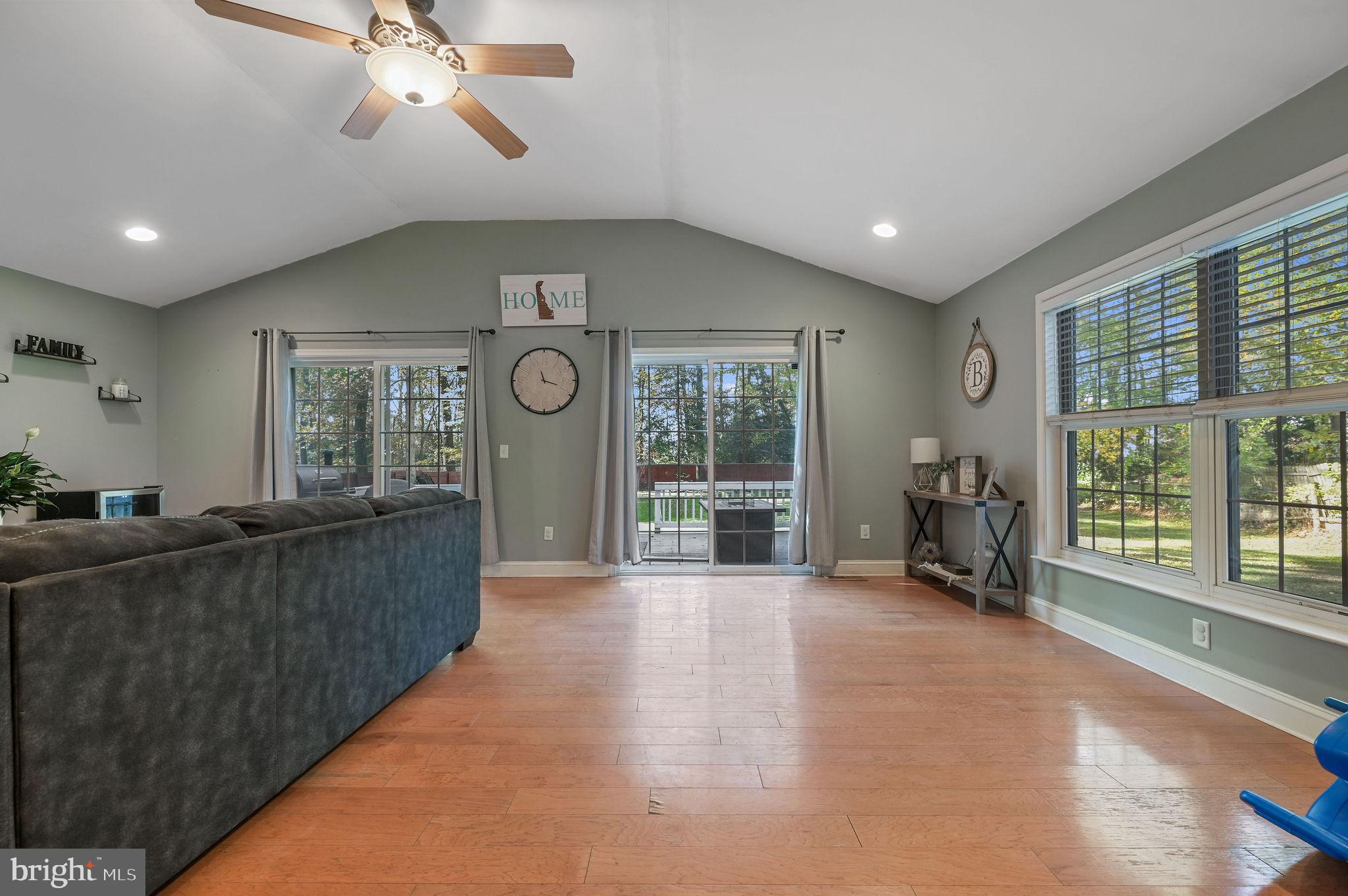 196 Mifflin Road Dover, DE 19904 - Photo 11 of 27 a living room with furniture and large windows