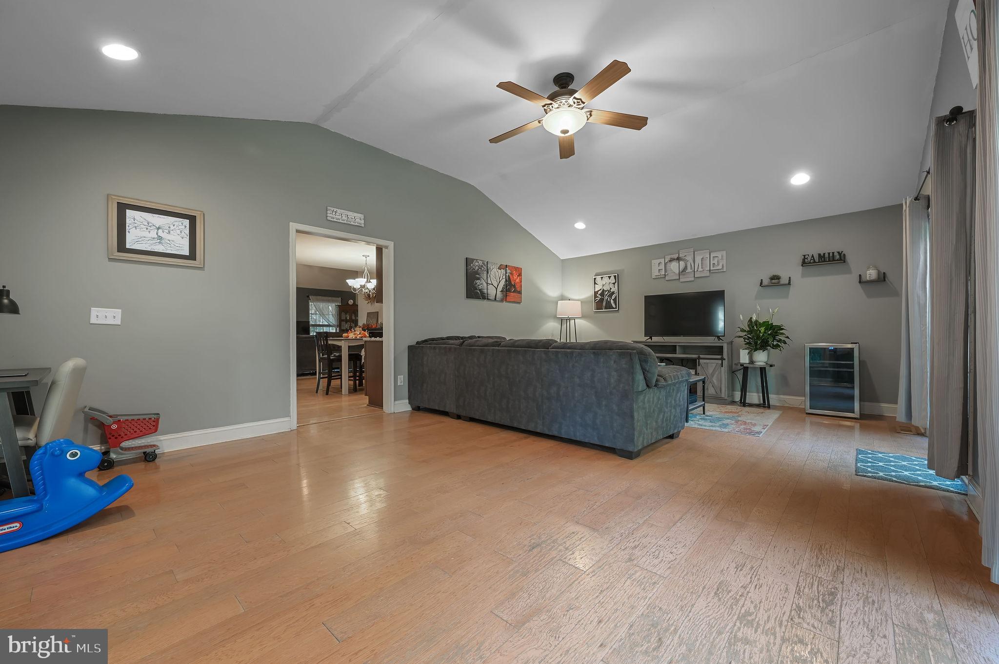196 Mifflin Road Dover, DE 19904 - Photo 12 of 27 a living room with furniture and a flat screen tv