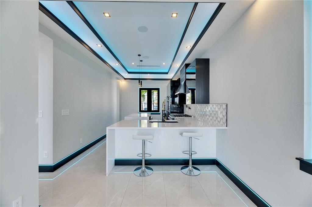 6538 Simone Shores Circle Apollo Beach, FL 33572 - Photo 23 of 88 a view of a hallway with workspace