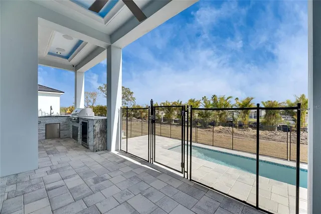 a view of swimming pool from a balcony